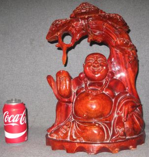 CARVED WOOD HAPPY BUDDHA SCULPTURE Carved Wood Happy Buddha Sculpture. Measures 16-1/2" tall x 11" wide x 7" deep. Condition is good. No damage. Starting Bid $60. Auction Estimate $120 - $200.  