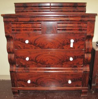 ANTIQUE EMPIRE CHEST of DRAWERS Antique Empire Style Chest of Drawers. Flamed Mahogany. 7 Drawers. Measures 56" tall x 47-1/2" wide x 21" deep. Condition is good. No damage. Starting Bid $200. Auction Estimate $250 - $400.  