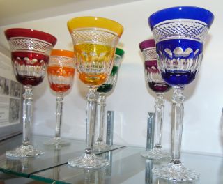 6 MULTI-COLOR CRYSTAL WINE GLASSES Beautiful Set of 6 Multi-Color, Cut to Clear Crystal Wine Glasses. Heavy and high quality European Leaded Crystal. Each measures 9" tall. Condition is New, Mint. No Damage. Includes Fitted and lined Gift Box. Starting Bid $160 for all 6. Auction Estimate $200 - $250. 