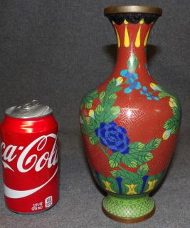 VINTAGE CLOISONNE' VASE Vintage Chinese Cloisonne' Vase. Measures 9-1/2" tall. Condition is good with exception of 2 dents with some enamel loss. Starting Bid $20. Auction Estimate $30 - $40. 