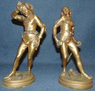 2 VINTAGE GILT BRONZE JESTERS by BOUILLARD 2 Beautiful Antique Gilt Bronze Figures of 2 Jesters. Very high Quality". Each Measures 11" tall. Each is signed "Bouillard". Condition is very good. Minimal surface wear to patina (see close-up photos). No damage. Starting Bid $200 for both. Auction Estimate $450 - $600.  