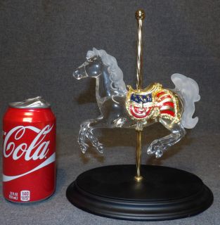 CRYSTAL CAROUSEL HORSE by DENTZEL Crystal Carousel Horse by Dentzel. Issued by Franklin Mint. Titled "Patriot". Issued 1991. Measures 9-1/2" tall x 7-1/2" wide x 5-1/2" deep. Condition is Very good. No damage. Starting Bid $30. Auction Estimate $50 - $60.  