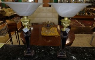 PAIR OF TABLE TORCHIERE LAMPS Pair of Table Torchiere Lamps with Glass Shades. Each measures 25-1/2" tall x 18" wide. Overall condition is very good. No damage. Starting Bid $50. Auction Estimate $150 - $250.  