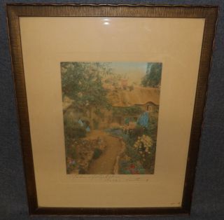 VINTAGE WALLACE NUTTING PRINT Vintage, Framed Wallace Nutting Print. Hand Colored. Titled "A Garden of Larkspur". Frame measures 17" tall x 14-1/4" wide. Overall condition is good. Minor wear to frame finish. Starting Bid $80. Auction Estimate $120 - $200. 