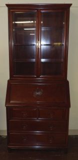 ORIENTAL CARVED ROSEWOOD SECRETARY BOOKCASE Oriental Carved Rosewood Secretary Bookcase. Measures 84" tall x 36" wide x 20" deep. Condition is Excellent. Mint. No damage. Starting Bid $500. Auction Estimate $750 - $1,000.    