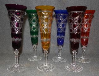 6 CRYSTAL CHAMPAGNE GLASSES Beautiful Set of 6 Bohemian Cut to Clear Crystal Champagne Glasses. Heavy and high quality European Leaded Crystal. Each measure 9" tall. Condition is New, Mint. No Damage. Includes Original Fitted Box. Starting Bid $160 for all 6. Auction Estimate $200 - $250.
