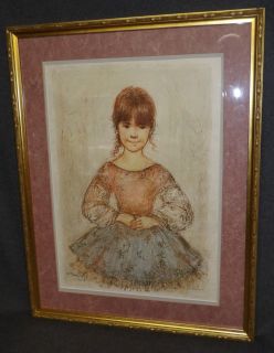 EDNA HIBEL "JENNIFER MARY" LITHOGRAPH  Framed and Matted Edna Hibel "Jennifer Mary" Lithograph. Limited Edition. Pencil Signed and Numbered. Frame measures 26-1/2" tall x 20" wide. Condition is Excellent. Mint. No damage. Starting Bid $80. Auction Estimate $150 - $200.  