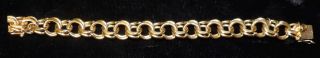 VINTAGE 14kt GOLD BRACELET Vintage 14kt Gold Bracelet. Approximately 1.58 ounces. Measures 7-1/2". Condition is very good. No damage. Starting Bid $2,000. Auction Estimate $2,000 - $3,000.   