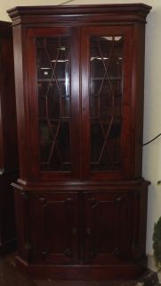MAHOGANY CORNER CABINET Mahogany Corner Cabinet. Measures 75" tall x 41" wide x 16" deep. Overall condition is good. No damage. Starting Bid $200. Auction Estimate $250 - $400.   