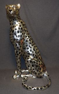 SILVERED BRONZE SITTING CHEETAH SCULPTURE Large, Silvered Bronze Sitting Cheetah Sculpture. High Quality Bronze with excellent Detail and patina. Measures 34" tall x 20" wide x 17" deep. Condition is Like New, Mint. No Damage at all. Starting Bid $1,500. Auction Estimate $2,000 - $2,500.