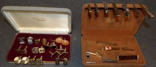 MISC LOT of 11 CUFF LINKS & 15 TIE CLIPS Misc Lot of 11 Vintage Pairs of Cuff Links and 15 Tie Clips. Overall condition is very good. Starting Bid $40. Auction Estimate $60 - $90.   