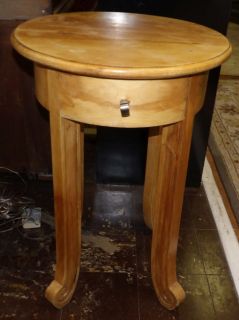 TEAK WOOD 1 DRAWER SIDE TABLE  Teak Wood 1 Drawer Side Table. Measures 29-1/2" tall x 20-1/2" wide. Overall condition is good. Minimal Wear. Starting Bid $80. Auction Estimate $150 - $200.    