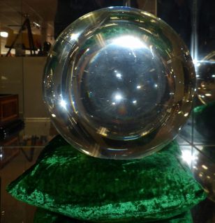 HUGE 200mm CRYSTAL BALL on VELVET BEAN BAG Huge 200mm Crystal Ball on a Green Velvet Bean Bag. Measures 8" wide. Condition is New. Excellent. Mint. No damage. Starting Bid $80. Auction Estimate $150 - $250.  