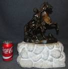 VINTAGE BRONZE MARLY HORSE SCULPTURE on MARBLE Vintage Bronze Marly Horse Sculpture on a Heavy Marble Base. Unsigned. Measures 16" tall x 12" wide x 5" deep. Overall condition is good. Wear consistent with age. Starting Bid $50. Auction Estimate $150 - $200. 