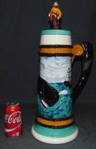 MOBY DICK LIDDED BEER STEIN MUG Large, Vintage Moby Dick Beer Stein or Mug with Lid. Measures 20" tall x 7-1/4" wide. Overall condition is Excellent. No Damage. Starting Bid $20. Auction Estimate $20 - $60.   