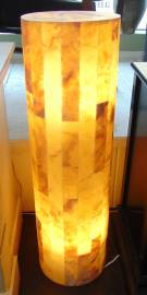 ONYX STONE BACKLIT PEDESTAL Large, Contemporary Onyx Stone Backlit Pedestal Lamp. Art Deco Style. Tall, cylindrical shape. Measures 39" tall x 11-1/2" wide. Condition is New, Mint. No Damage. Starting Bid $300. Auction Estimate $350 - $500. 