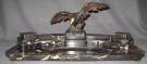 GEORGES GARDET (French 1863-1939) BRONZE & MARBLE INKWELL Vintage Georges Gardet (French 1863-1939) Bronze Eagle and Marble Double Inkwell. Artist Signed. Measures 9-1/2" tall x 22" wide x 9-1/2" deep. Condition is good. Some Wear. No Damage. Inkwell liners not present. Georges Gardet studied under Aimé Millet and Emanuel Frémiet at the École des Beaux Arts in Paris. He is known for his sculptures of big game animals executed in marble, onyx, and bronze. Starting Bid $150. Auction Estimate $500 - $750. 