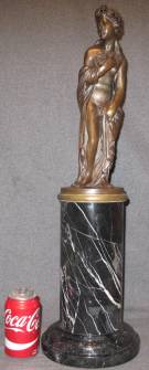 VINTAGE FIGURAL BRONZE ON MARBLE BASE Vintage Figural Semi-Nude Woman Bronze on a tall Marble Base. High Quality Bronze with excellent Detail and patina. Measures 27" tall x 8" wide. Condition is Very Good. No Damage at all. Starting Bid $350. Auction Estimate $500 - $750.    