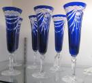 6 COBALT BLUE CRYSTAL CHAMPAGNE GLASSES  Beautiful Set of 6 Cobalt Blue Bohemian Cut to Clear Crystal Champagne Glasses. Heavy and high quality European Leaded Crystal. Each measure 9" tall. Condition is New, Mint. No Damage. Includes Original Fitted Box. Starting Bid $160 for all 6. Auction Estimate $200 - $250. 