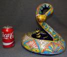 MEXICAN FOLK ART CERAMIC RATTLESNAKE SCULPTURE Hand Painted Mexican Folk Art Style Ceramic Rattlesnake Sculpture. Measures 12" tall x 11" wide x 14-1/2" deep. Marked "Mexico". Condition is Excellent. Mint. No damage. Starting Bid $40. Auction Estimate $150 - $250. 