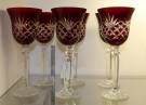 6 RUBY RED BOHEMIAN CUT CRYSTAL WINE GLASSES Beautiful Set of 6 Ruby Red, Bohemian Cut to Clear Crystal Wine Glasses. Heavy and high quality European Leaded Crystal. Each measures 8-7/8" tall. Condition is New, Mint. No Damage. Includes Original Fitted Box. Starting Bid $160 for all 6. Auction Estimate $200 - $250. 