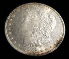 1880o MORGAN SILVER DOLLAR 1880o Morgan Silver Dollar. Starting Bid $30. Auction Estimate $30 - $100.  