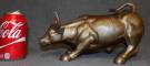 BRONZE WALL STREET CHARGING BULL SCULPTURE Bronze Wall Street Bull Sculpture. The "Charging Bull", Also known as the Wall Street Bull or the Bowling Green Bull. Measures 7" tall x 11-1/4" wide. Condition is New, Mint. No Damage. Starting Bid $200. Auction Estimate $300 - $450.    