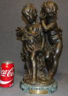 AUGUSTE MOREAU BRONZE "WHISPERING CHILDREN" SCULPTURE Vintage Bronze Sculpture after Auguste Moreau (French 1834-1917). Titled "Whispering Children". Artist Signed and Foundry mark. High Quality Bronze with excellent Detail and patina. Measures 17-3/4" tall x 12-1/2" wide. Condition is very good. No Damage. Starting Bid $300. Auction Estimate $500 - $800.   