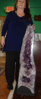 GIANT 184 lb. BRAZILIAN AMETHYST QUARTZ CATHEDRAL Giant Amethyst Quartz Geode Cathedral from Brazil. Very heavy. Weighs over 184 pounds. Measures 41-1/4" tall x 12-1/2" wide x 7" deep. Condition is Excellent. Mint. No damage. Starting Bid $2,000. Auction Estimate $2,500 - $3,500.	