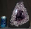 BRAZILIAN AMETHYST QUARTZ CATHEDRAL Large, Amethyst Quartz Geode Cathedral from Brazil. Very heavy. Weighs approximately 34 pounds. Measures 12-1/4" tall x 10-1/2" wide x 7" deep. Condition is Excellent. Mint. No damage. Starting Bid $350. Auction Estimate $500 - $800.   